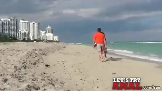 Man enjoying wet beach, red lingerie, anal